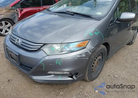 2010 Honda Insight Lx z USA, uszkodzony, nr VIN JHMZE2H50AS042743